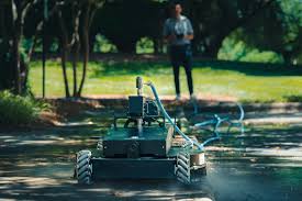 Lavo Bot cleaning a residential concrete driveway and patio